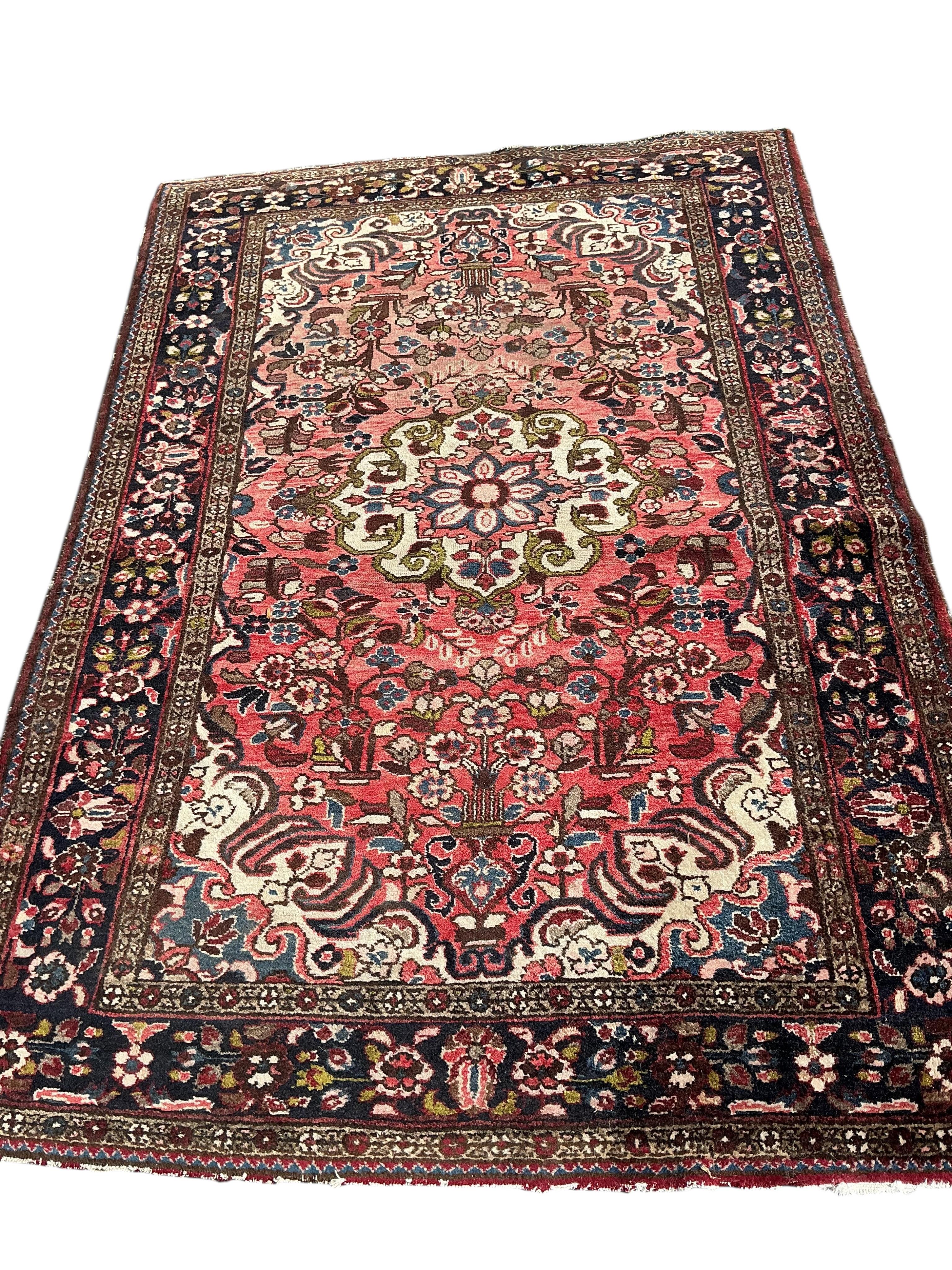 A Heriz carpet, 210 x 145cm